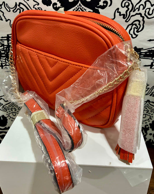 BURNDT ORANGE CHEVRON TASSEL CROSSBODY BAG