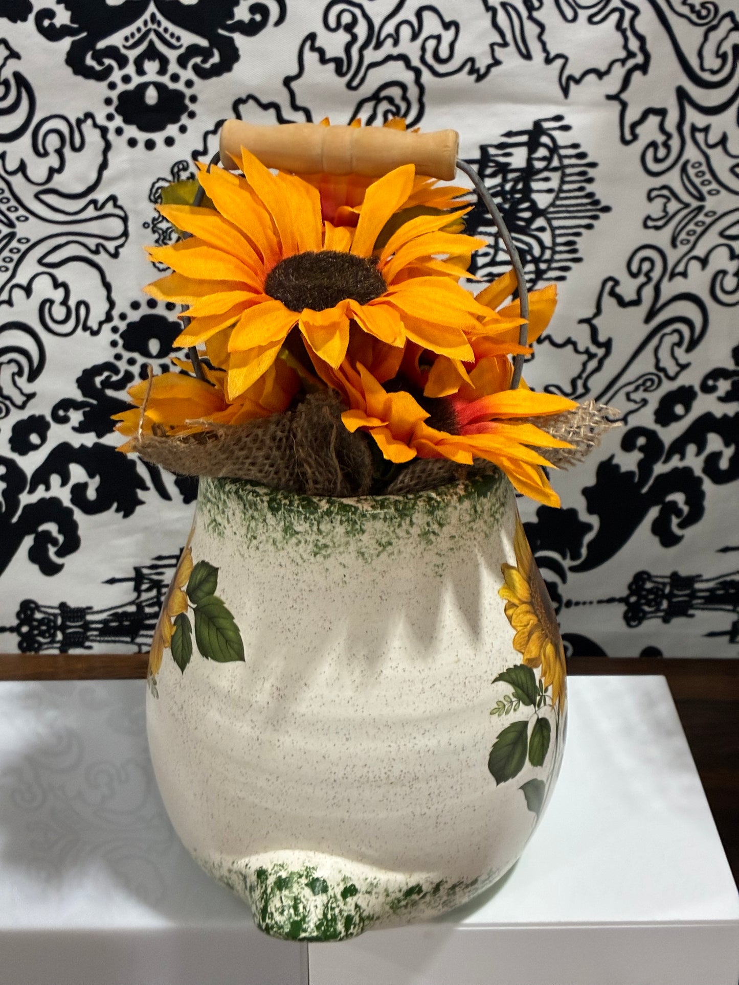 Sunflowers in Glass Pottery