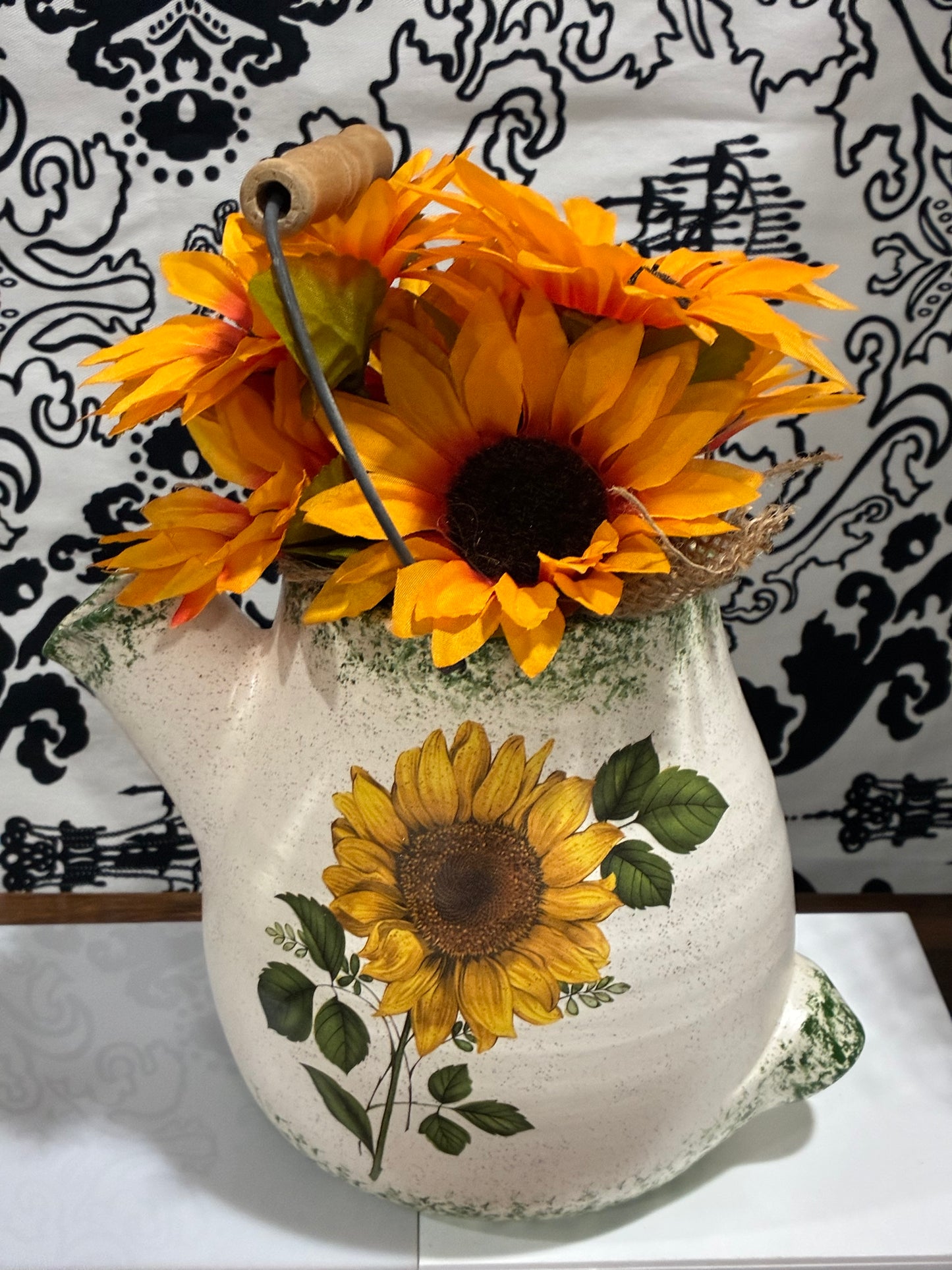 Sunflowers in Glass Pottery