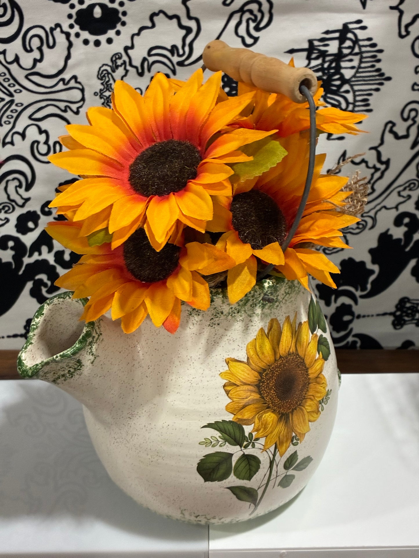 Sunflowers in Glass Pottery