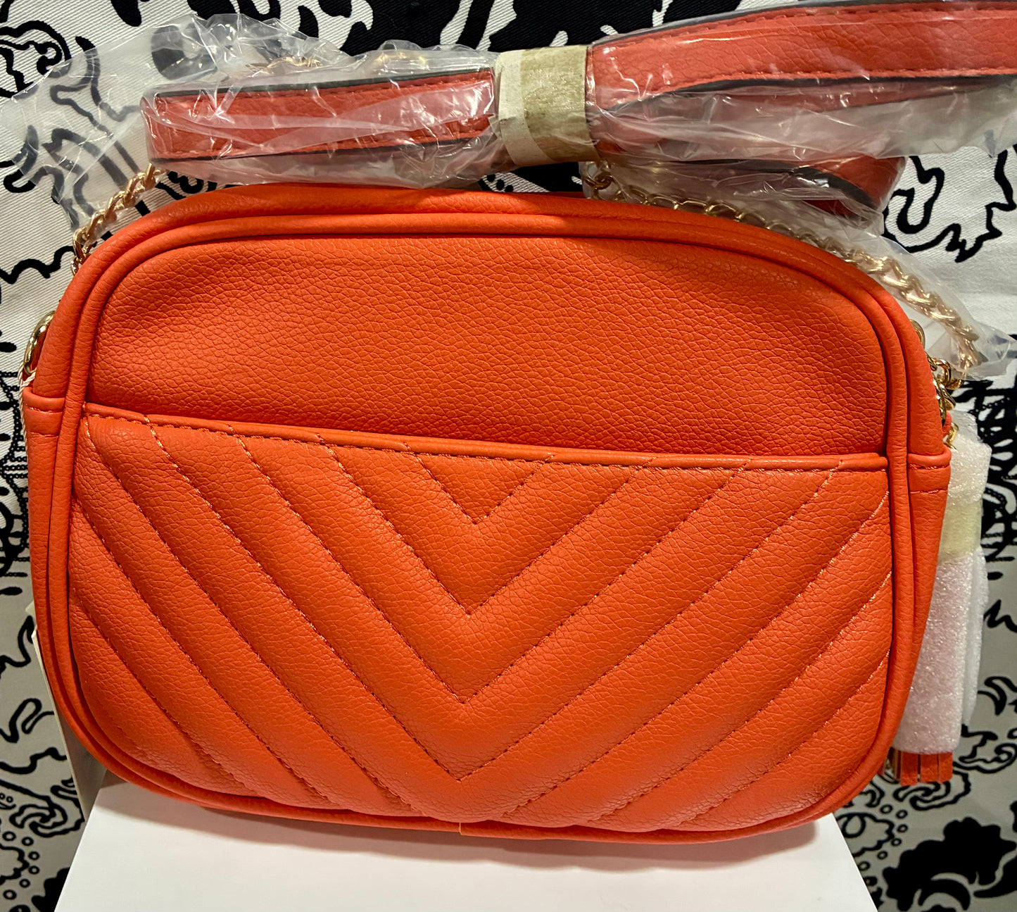 BURNDT ORANGE CHEVRON TASSEL  CROSSBODY BAG