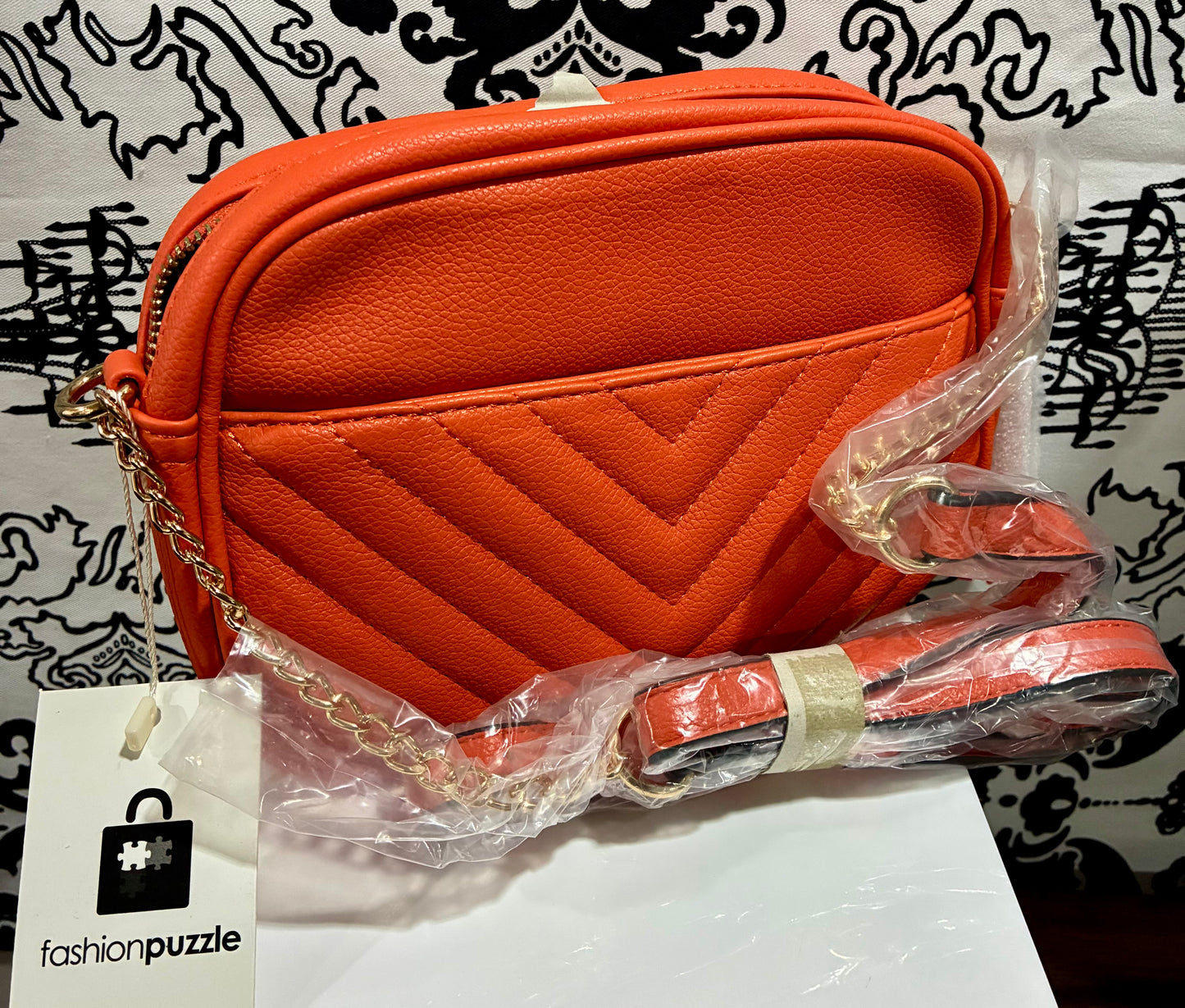 BURNDT ORANGE CHEVRON TASSEL  CROSSBODY BAG