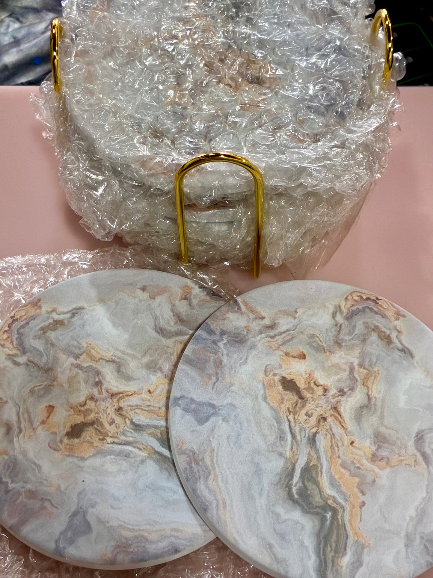 9 piece  ceramic coaster set  with a gold tone holder