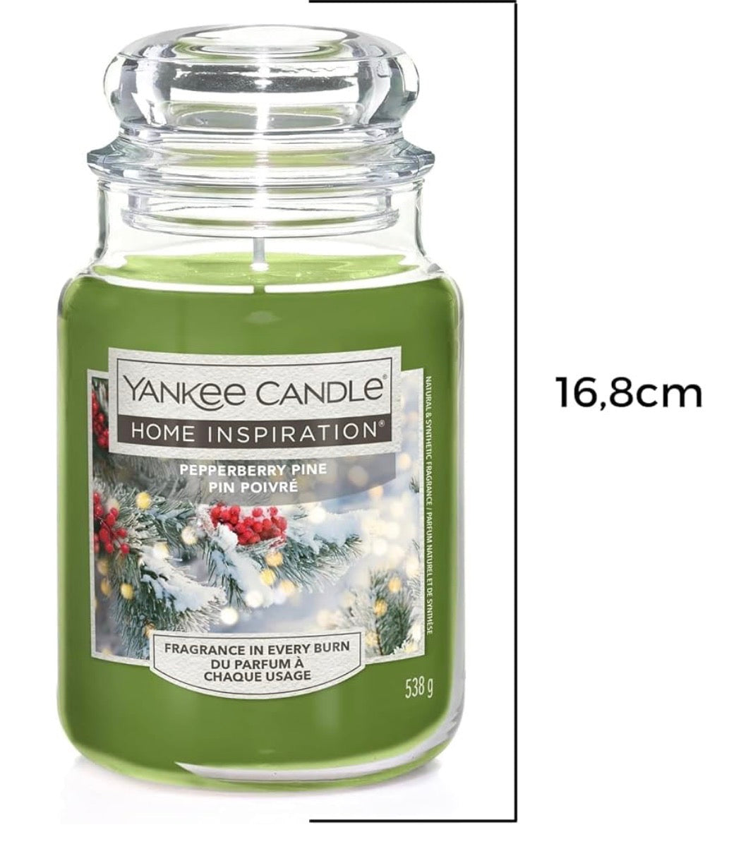 YANKEE CANDLE "Santa Arrived" scent, which blends balsam, pine, and eucalyptus.